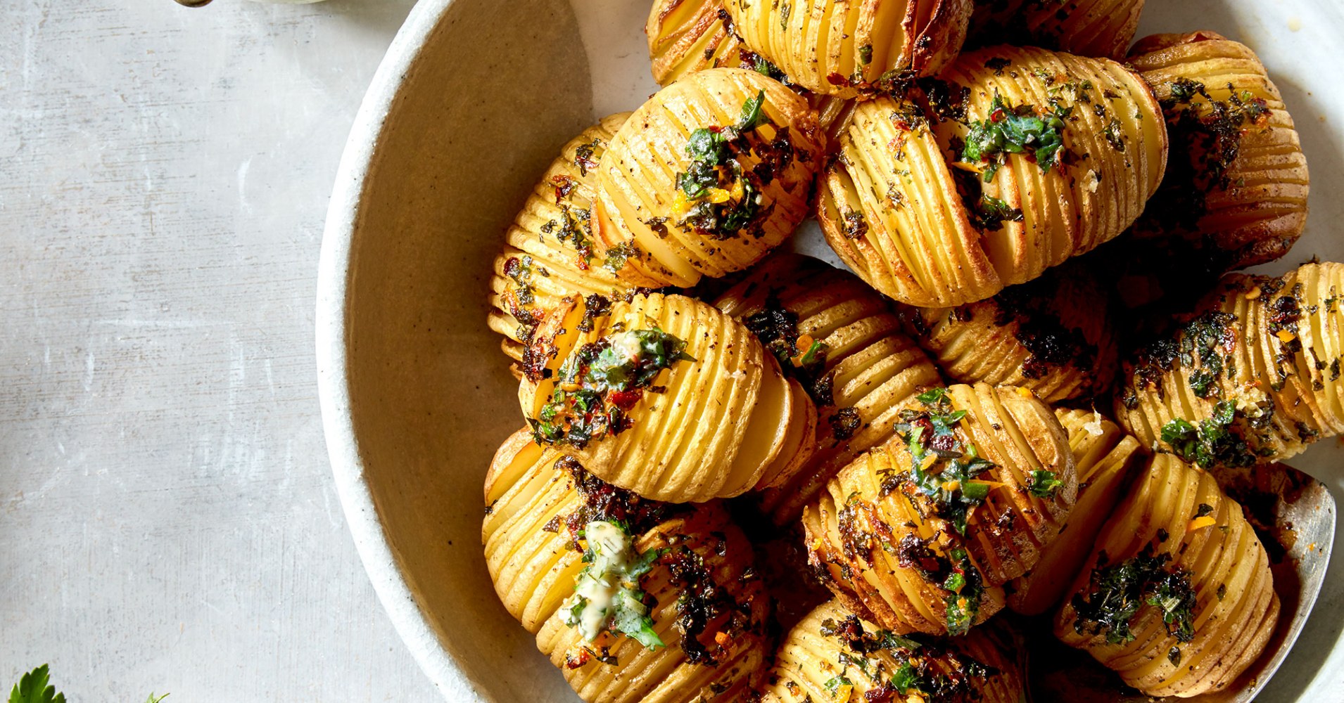 Roast Herb, Chilli and Orange Butter Hasselback Potatoes Recipe | myfoodbook | How to make hasselbac